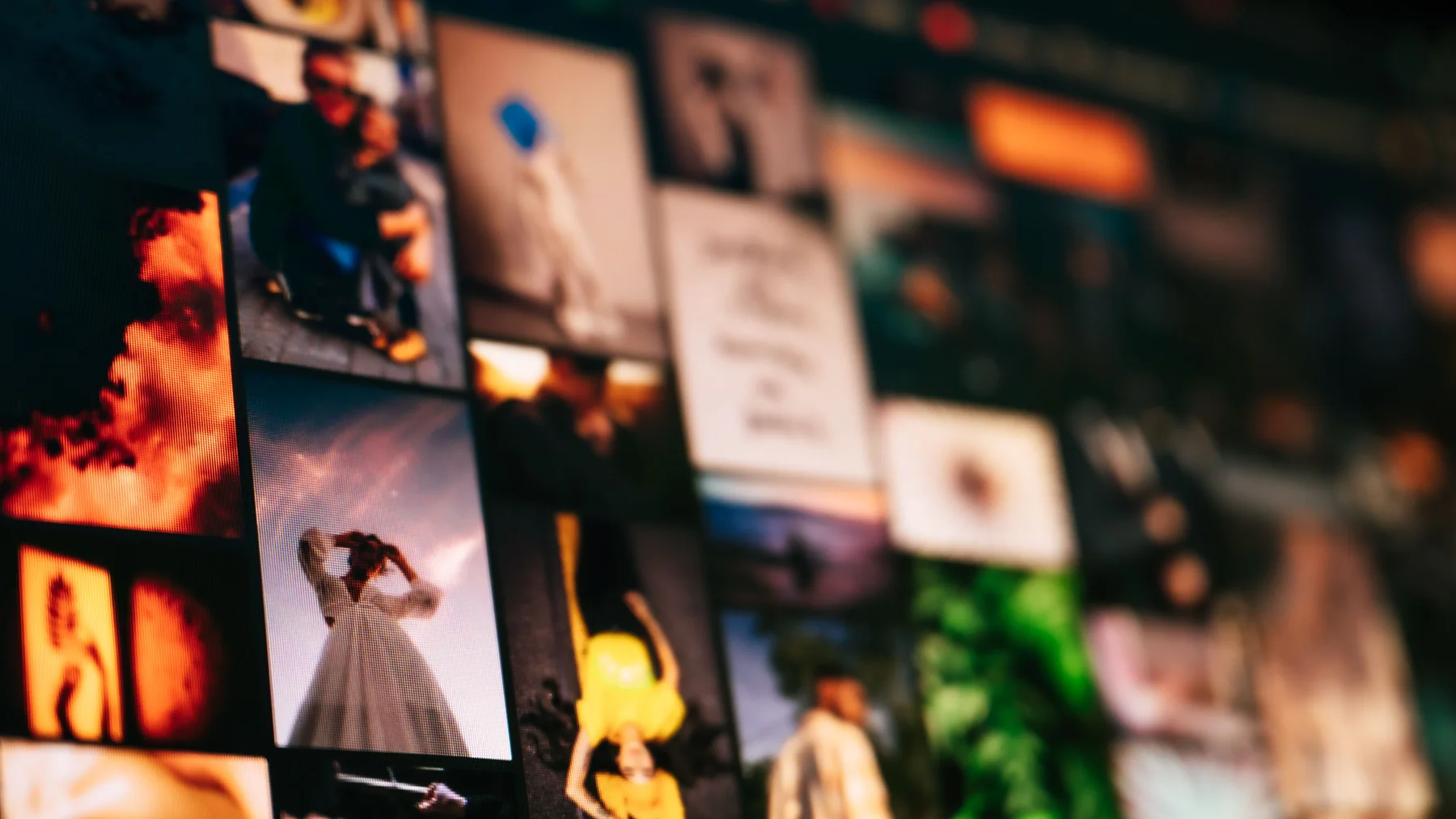 A softly focused wall of creative imagery and moving-image frames